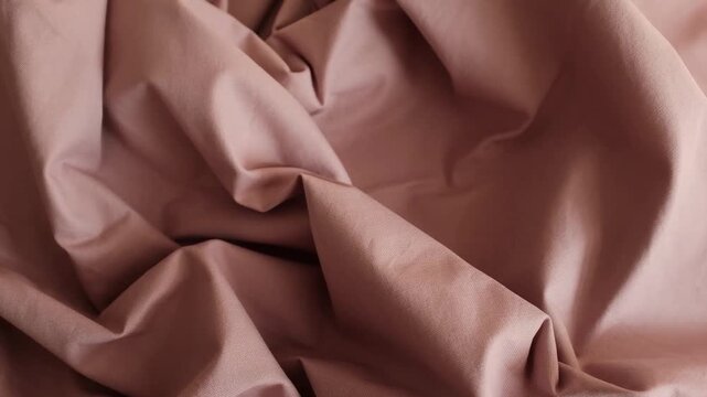 Dusty rose fabric. Perfect for fashion branding campaigns, textile promotional videos or interior design, sewing and tailoring business, textile stores.
