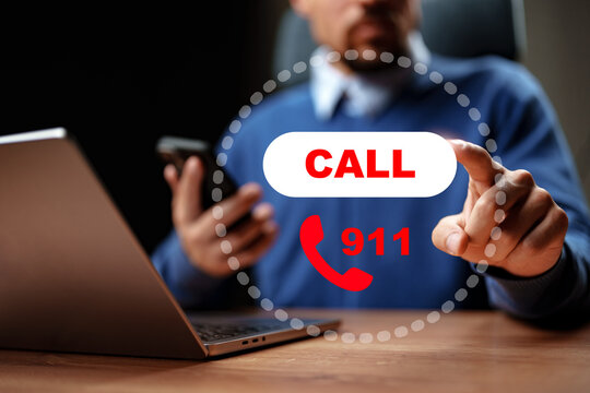 Emergency call to 911 from a person using a phone and laptop in an indoor setting