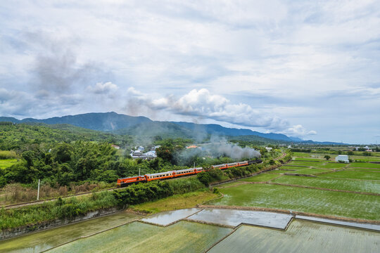 Steam locomotive passing the field in Fuli Township, Hualien County, Taiwan