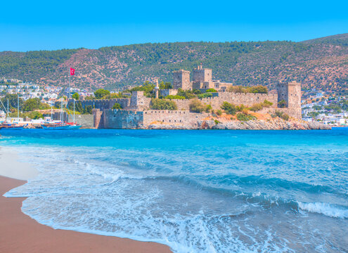 Panoramic view of Saint Peter Castle (Bodrum castle) and marina  - View of Bodrum beach in the foreground - Bodrum, Turkey