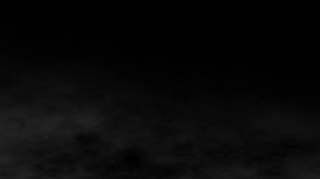 Low fog and smoke overlay with soft drifting haze on a seamless black background