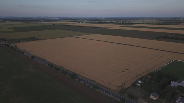 High Aerial View of Rural Road and Farmland Near Kaplna, Slovakia