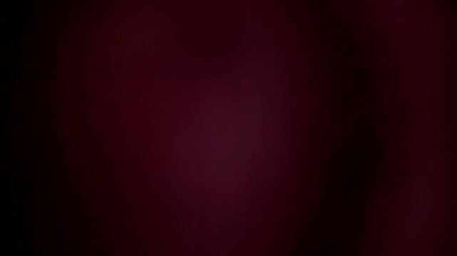 Analog abstract video of large pink bokeh shapes drifting slowly through a soft foggy light wash, creating a smooth dreamlike transition and background for overlays, titles, and motion graphics.