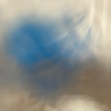 Abstract blurred sky background in soft blue and beige tones