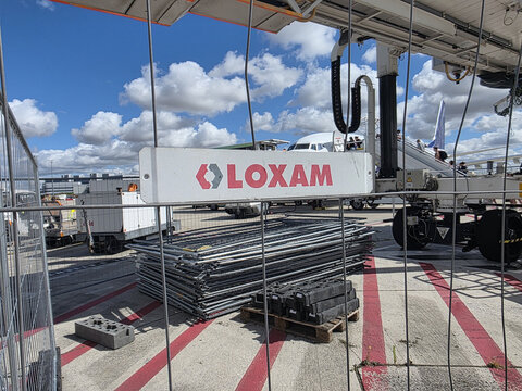 July 1st 2026, Loxam logo in a airport.