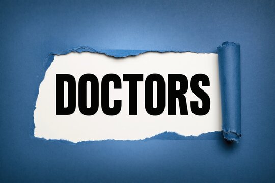Black text doctors written under torn blue paper