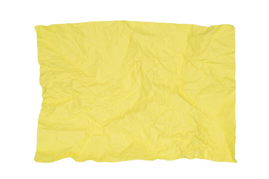 crumpled bright yellow paper sheet lies on a white isolated background