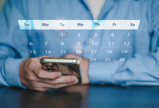 Time management, project scheduling, appointment planning, and professional productivity optimization for business. Businessman holding smartphone with digital calendar interface overlay.