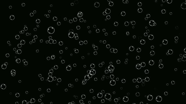 Water bubbles moving from bottom to top. Rising bubbles under transparent water. Rising air bubbles on black background. Gas bubbles floating of champagne. Soap bubbles fly up overlay in close up.