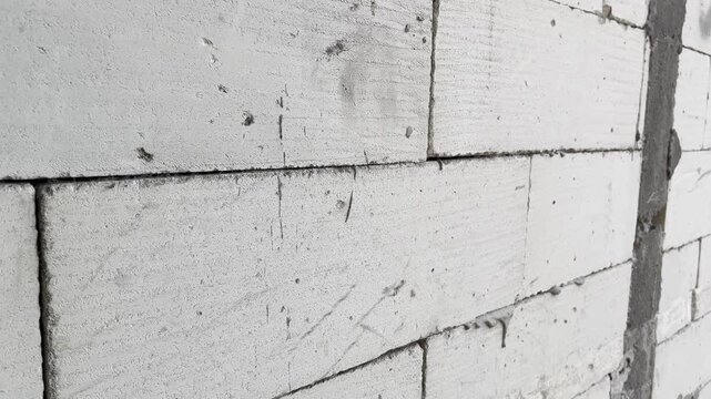 Close up of raw lightweight concrete block wall