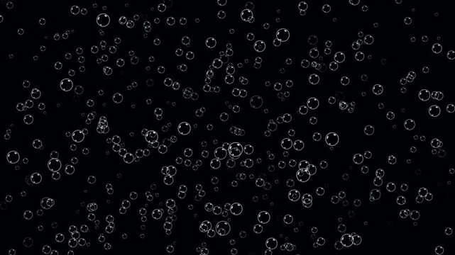 Water bubbles moving from bottom to top. Rising bubbles under transparent water. Rising air bubbles on black background. Gas bubbles floating of champagne. Soap bubbles fly up overlay in close up.