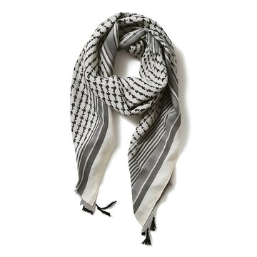Traditional keffiyeh scarf with black and white geometric pattern and fringe, a classic middle eastern headwear accessory isolated on white background