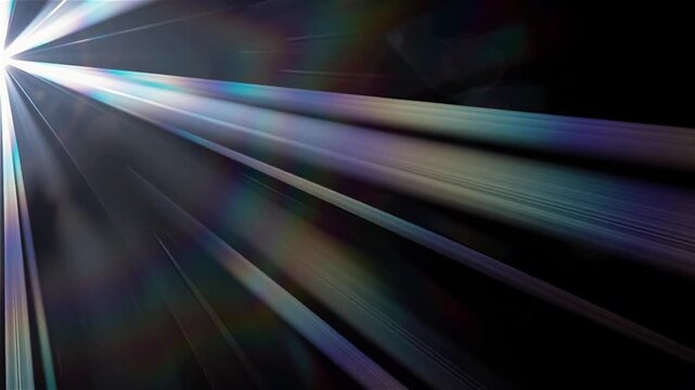 Bright lens flare with prism light rays shimmering against dark background motion footage.