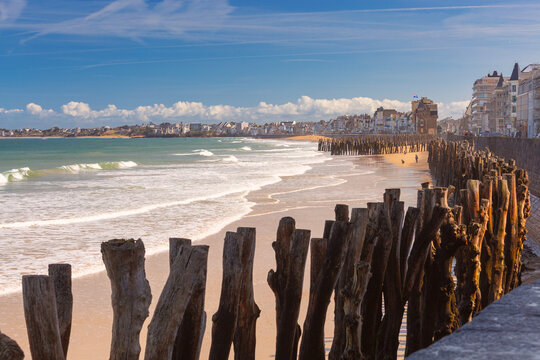 Wooden Breakwaters and Sandy Beach Along the Coast of Saint Malo France