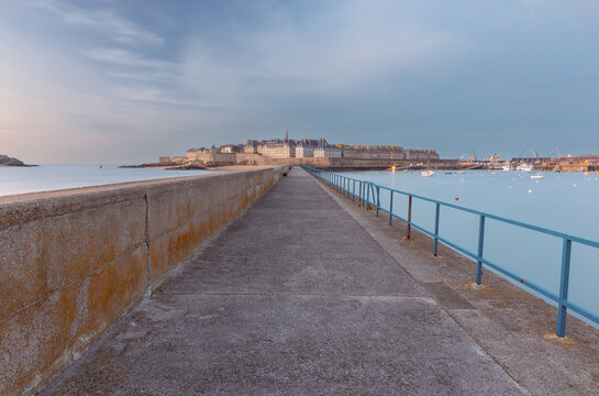Historic Stone Buildings and City Walls at Sunset in Saint Malo, France