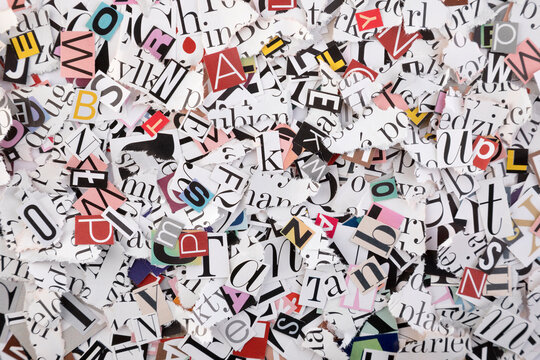 Pile of many colorful letters from newspapers and magazines