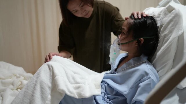 A concerned mother holds her sick child's hand while the child receives oxygen therapy in a hospital bed. Family support, pediatric healthcare, compassion, medical treatment, and hope for recovery.