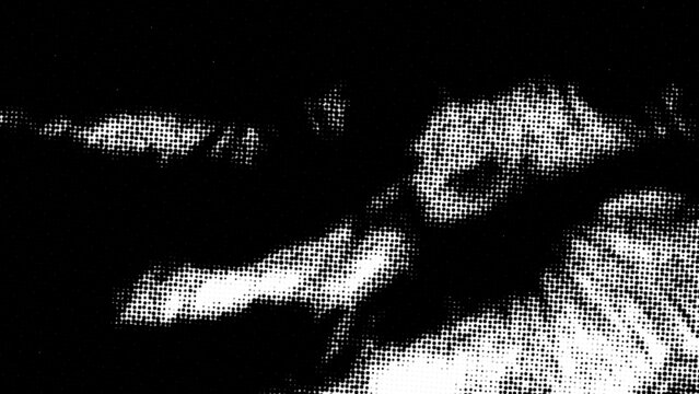 Abstract black and white halftone pattern with contrast dotted texture and grayscale gradient