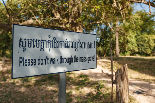 A sign at the monument in Phnom Penh to the victims of the Khmer Rouge at a  mass grave site, Cambodia.