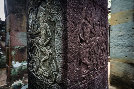 Apsara dancers carved on column