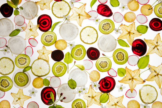 Citrus fruit, kiwi, variety fruits  segments on a white background, top view