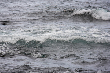 Close up of deep blue ocean waves and white sea foam at Punalu'u on the Big Island Hawaii © Joao Vieira