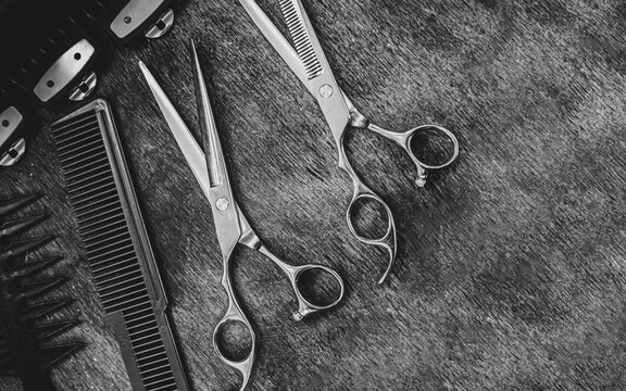 combs and scissors for haircuts lie on a shelf in the cabin