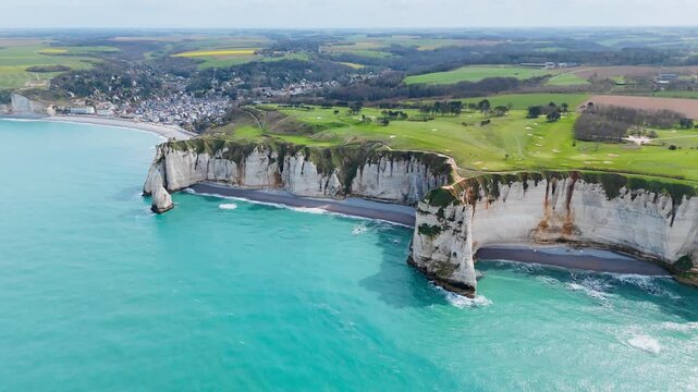 Normandy coast at Etretat, classic French seaside destination for natural landmarks, chalk cliffs and sea views