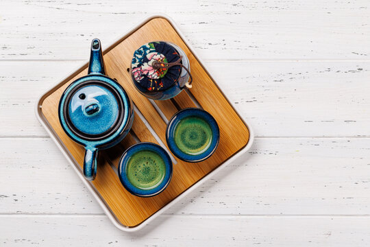 Asian tea ceremony set with teapot and cups