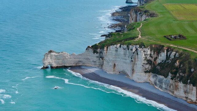 Limestone and chalk cliff landscape on Normandy coast, France, with geological formations above English Channel
