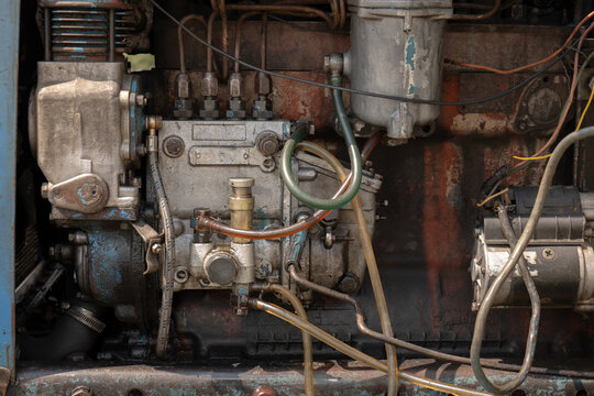 Vintage diesel engine mechanics and dirty metal components