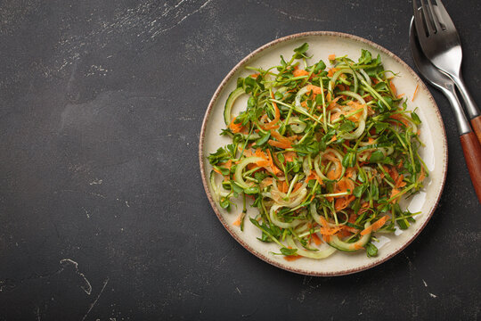 Healthy pea shoot micro greens salad fresh vegetables healthy diet vegan fibre vitamins copy space
