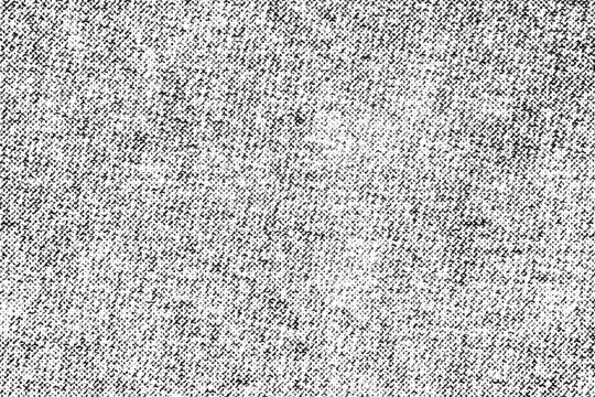 Fine black printed noise forms a dense rectangular texture crossed by a pale diagonal band.