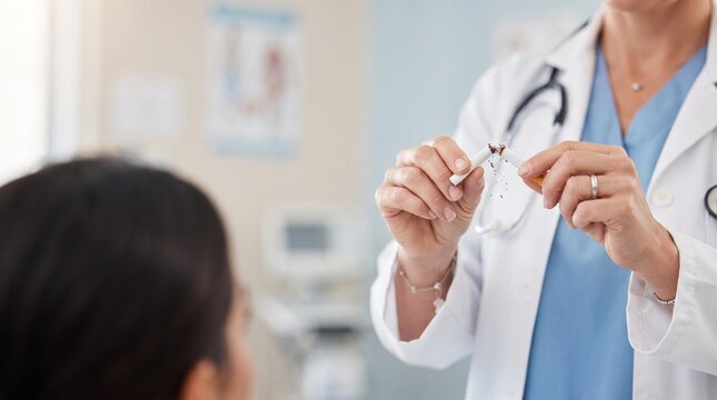 Doctor Breaking Cigarette in Half Concept of Smoking Cessation and Healthy Lifestyle