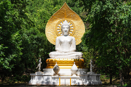 Phra Phuttha Metta, a white Buddha statue at Wat Tham Phra Phothisat in Saraburi, Thailand.