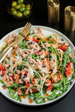 Fresh Tuna Salad with Onions and Cherry Tomatoes. Italian Mediterranean Cuisine