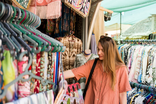 Woman Shopping in Central Asia Bazaar
