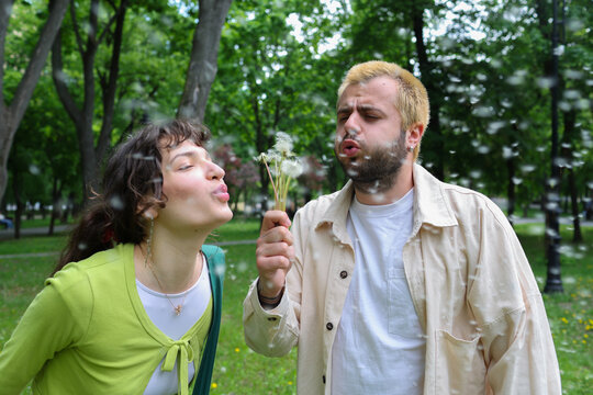 young couple walking in the park