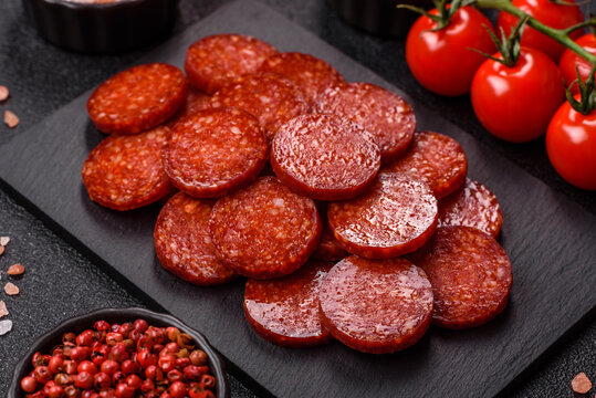 Slices of smoked pepperoni or salami for making homemade pizza. Sliced pepperoni