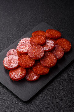 Slices of smoked pepperoni or salami for making homemade pizza. Sliced pepperoni