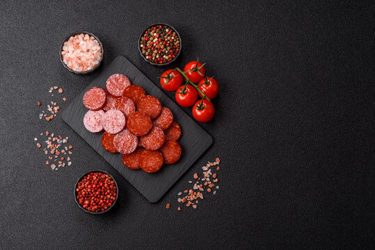Slices of smoked pepperoni or salami for making homemade pizza. Sliced pepperoni