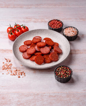 Slices of smoked pepperoni or salami for making homemade pizza. Sliced pepperoni