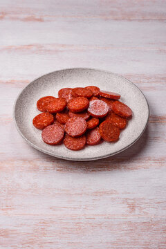 Slices of smoked pepperoni or salami for making homemade pizza. Sliced pepperoni