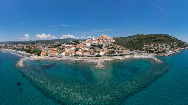 Aerial drone view of Cervo historic hilltop village on Mediterranean sea coast in Liguria Italy