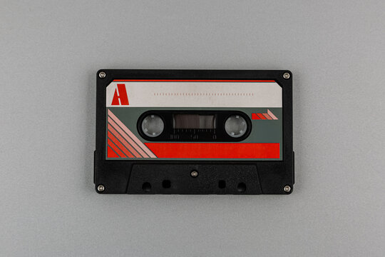 Retro audio cassette tape on grey back