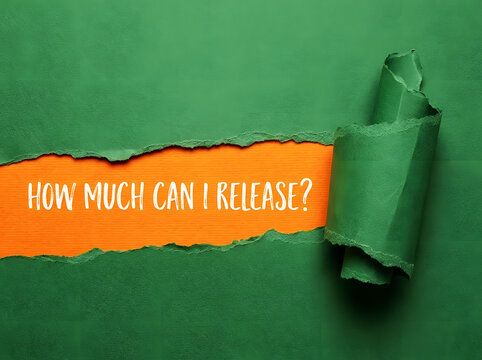 How Much Can I Release Inspirational Message Revealed Through Torn Green Paper With Vibrant Orange Background Minimalist Concept Design