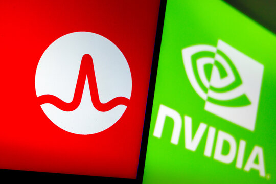 Raleigh, North Carolina - August 2, 2026: Broadcom logo beside Nvidia logo on two angled screens