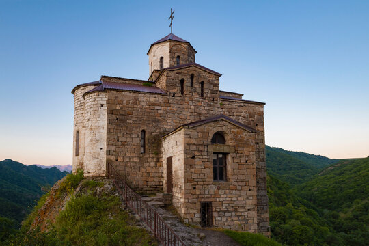 The medieval ShoanaTemple (Church of St. George the Victorious) in in the early July morning. Karachay-Cherkessia, Russia