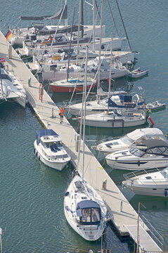 Yachts moored along a pontoon seen from above in Sweden