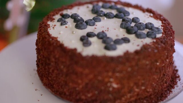 Delicious Red Velvet Cake with Cream Cheese Frosting and Blueberries